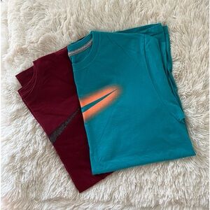 TWO NIKE T SHIRTS